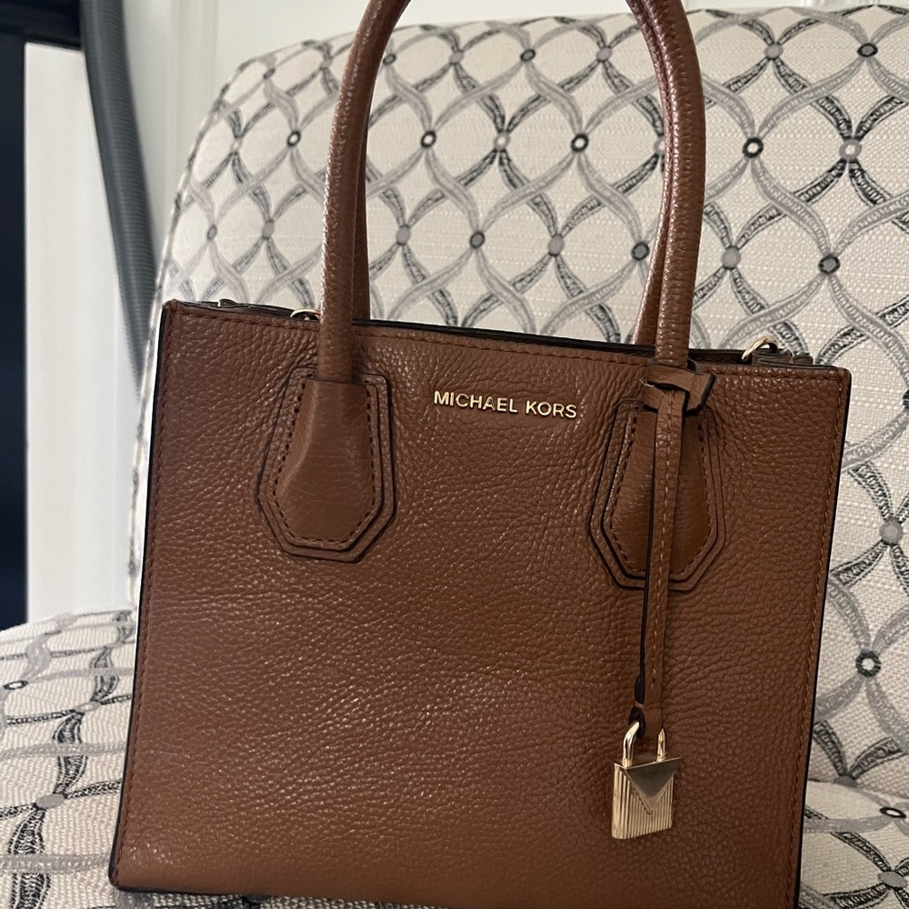 Michael Kors Brown Satchel with Structured Shape and Gold Hardware.